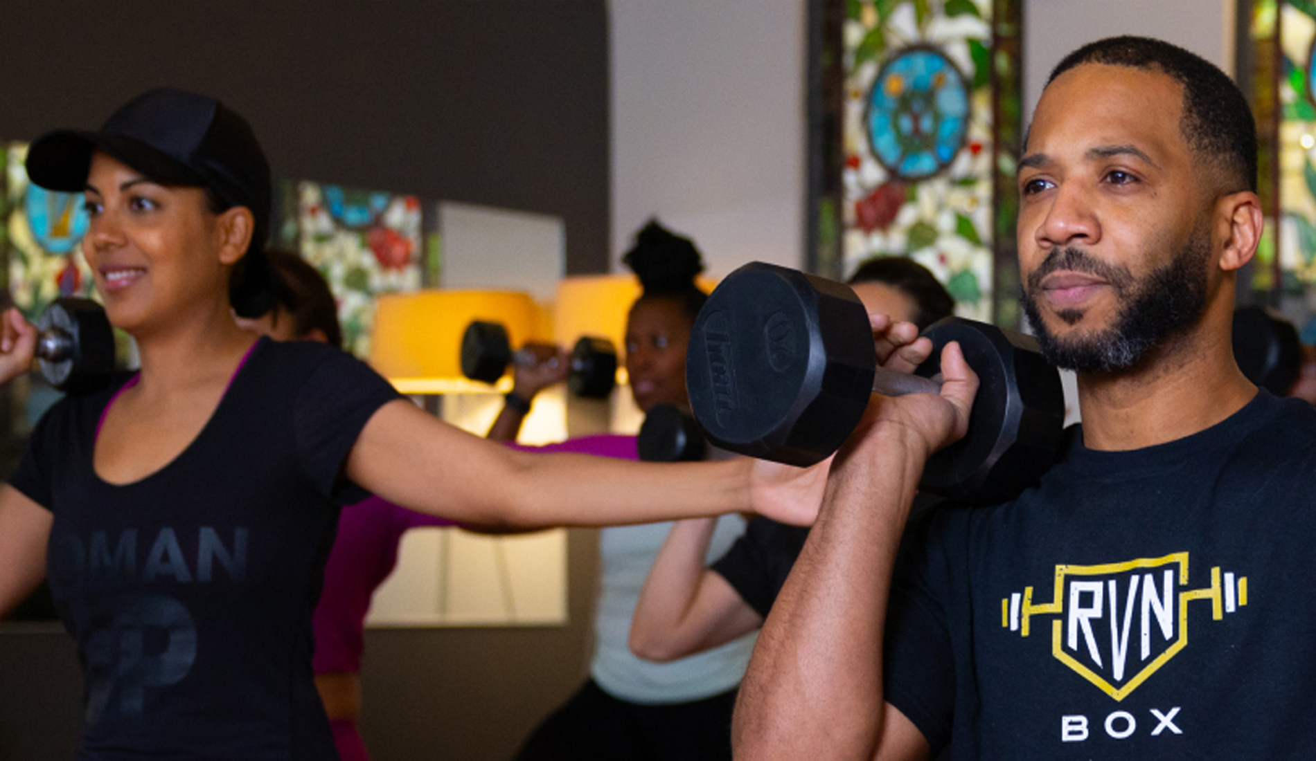 Group fitness class with free weights at Sanctuary Body with Wayne McFaddon of RVN Box.