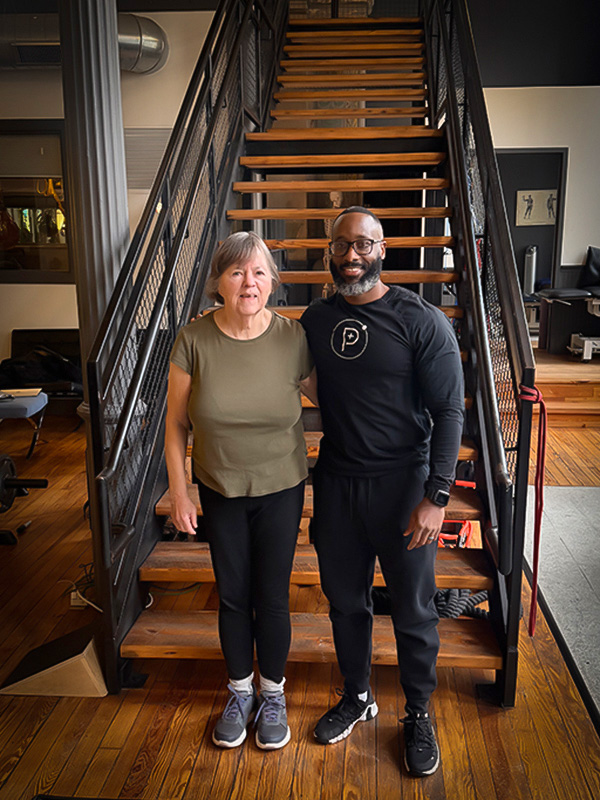 Sanctuary Body client Rachel in the studio with her trainer, Pete.